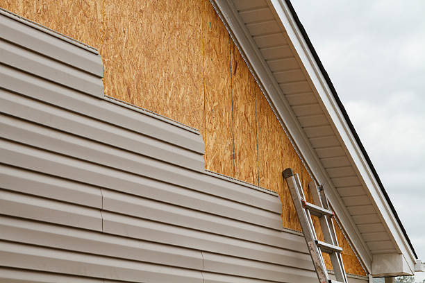 Professional Siding Contractor technician working in Plainview, NY